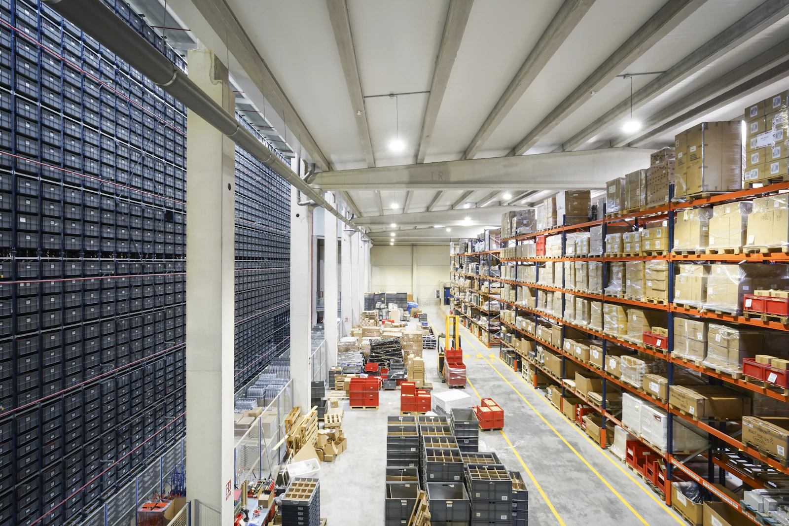 Large warehouse with stacked pallets and inventory